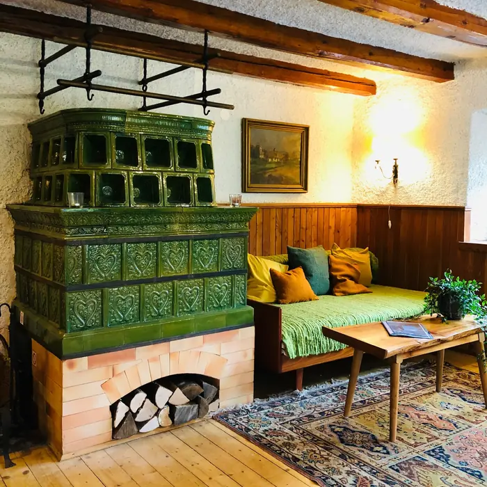 Dining nook with stained-glass windows and a table set for breakfast
