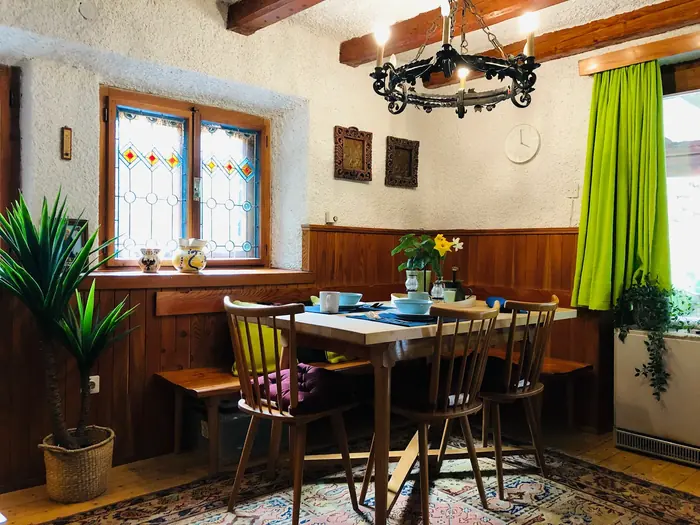 Inside Red Beech Cabin — original wood-beamed interior (photo 13)