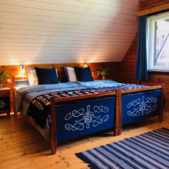 Inside Red Beech Cabin — original wood-beamed interior (photo 22)